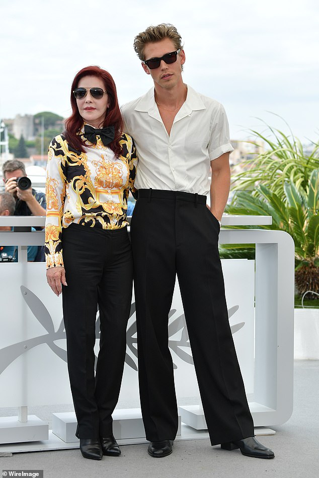 Gorgeous: The 77-year-old actress cut a chic figure in a gold blouse and black trousers, teamed with heeled boots