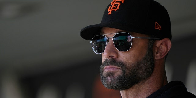 Manager Gabe Kapler of the San Francisco Giants looks up from the dugout against the Miami Marlins at Oracle Park April 9, 2022 in San Francisco. 