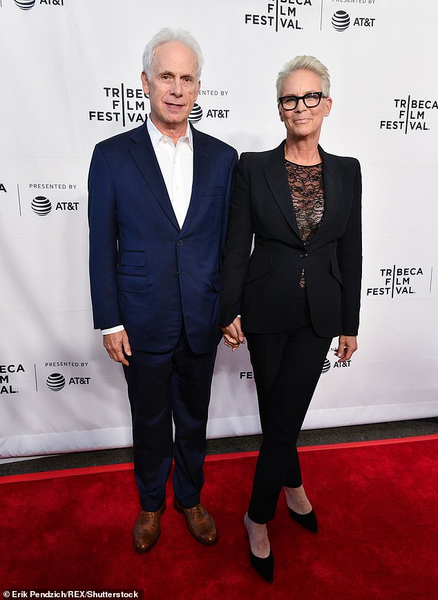 'It's speaking a new language': Last year, the Halloween Kills producer star admitted that she and her 37-year-old husband — Emmy winner Christopher Guest (L, pictured in 2019) — 