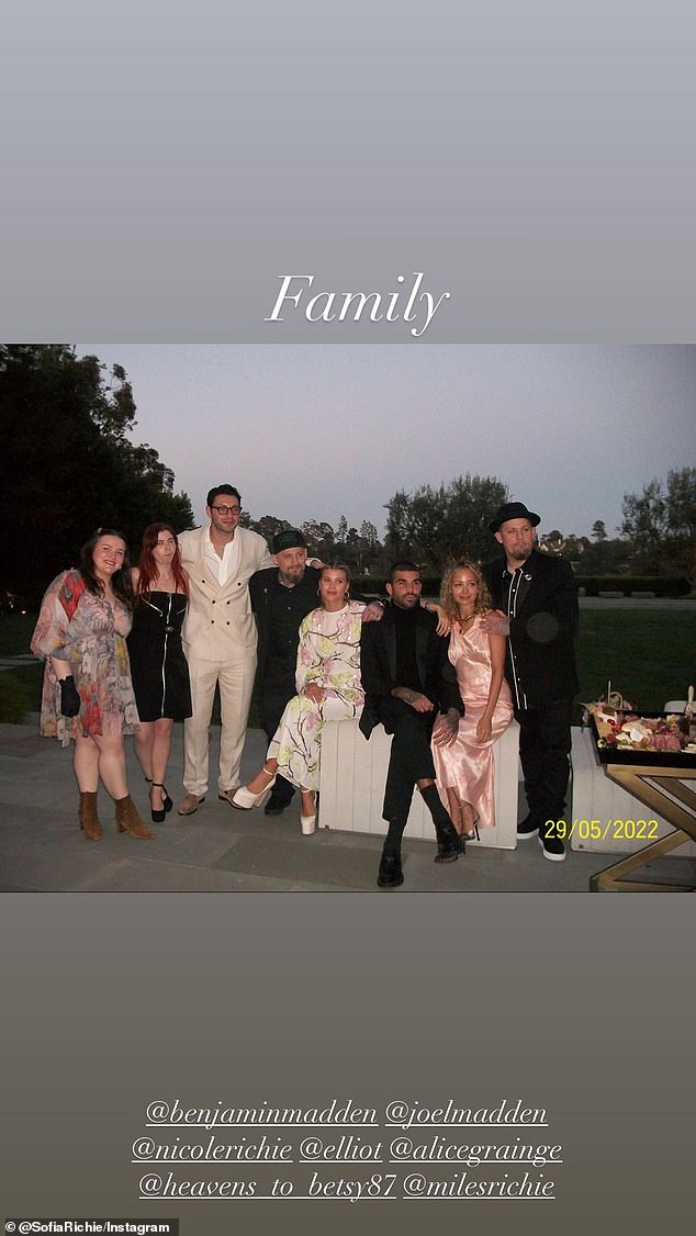 We're Family: And she posed with her brother Miles as well as Nicole and her husband Joel Madden and others