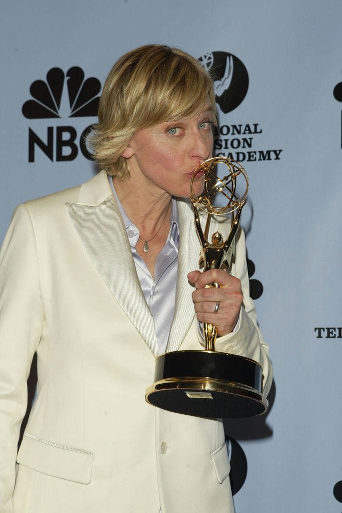 Ellen DeGeneres holds up an award for her talk show at the 31st Annual Daytime Emmy Awards May 21, 2004.  (Photo: Peter Kramer/Getty Images)