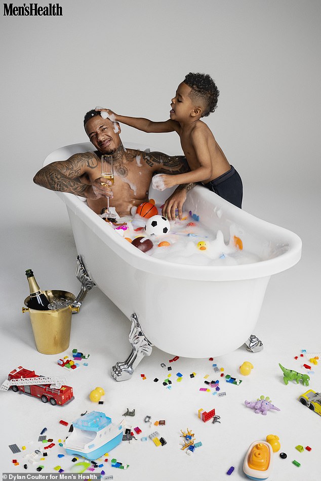 Nick Cannon gave fans a glimpse of his muscular chest alongside his son Golden during a photo shoot with Men's Health