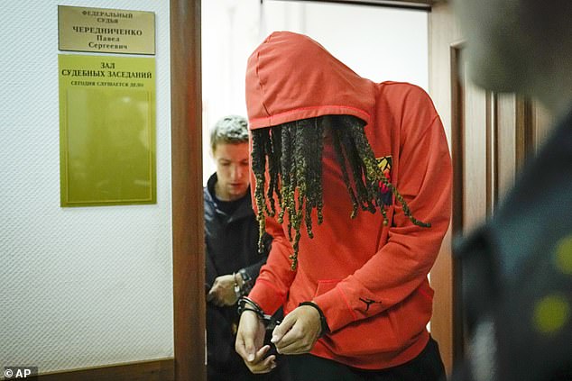 Phoenix Mercury basketball player Brittney Griner, 31, was arrested at Moscow Airport on February 18 for allegedly bringing into the country vape cartridges containing hash oil, which is illegal in Russia.  Pictured leaving court in Moscow last month