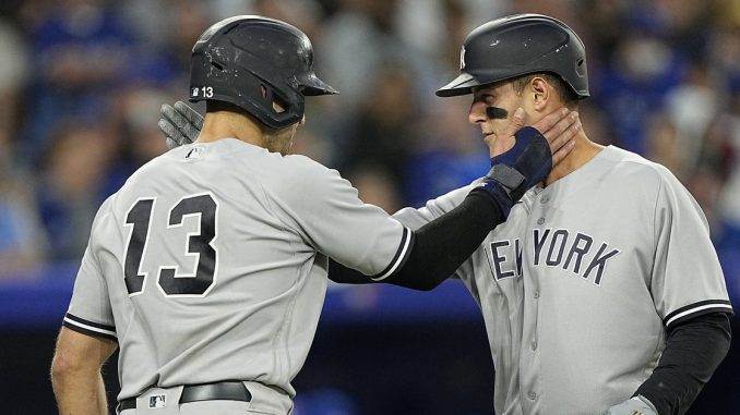 The Yankees' fireworks in the fifth inning set off a 12-3 in Toronto

