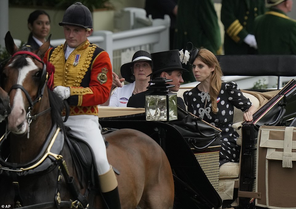 The Queen appeared concerned when the incident happened upon her arrival on day five of Royal Ascot and is seen here grabbing the side of the carriage