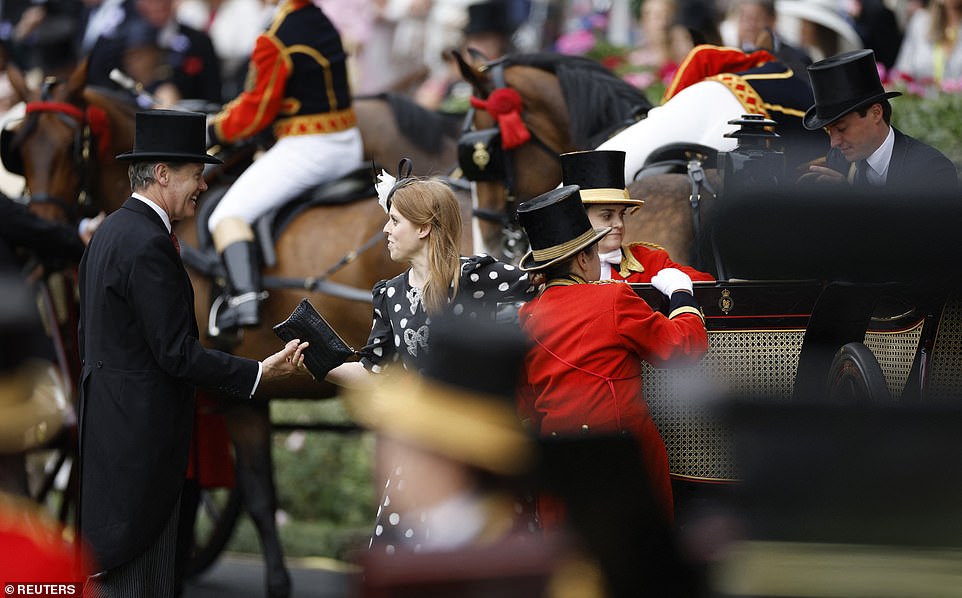 Princess Beatrice, who was in the second carriage of the royal procession, was unharmed and appeared to laugh after the incident