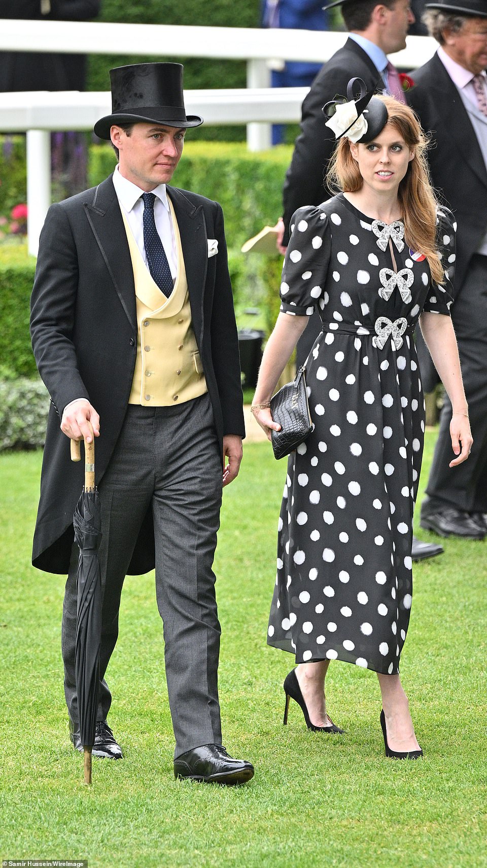 The couple dressed elegantly for their day, with the royal donning a navy blue and white polka dot dress while her husband opted for a traditional suit