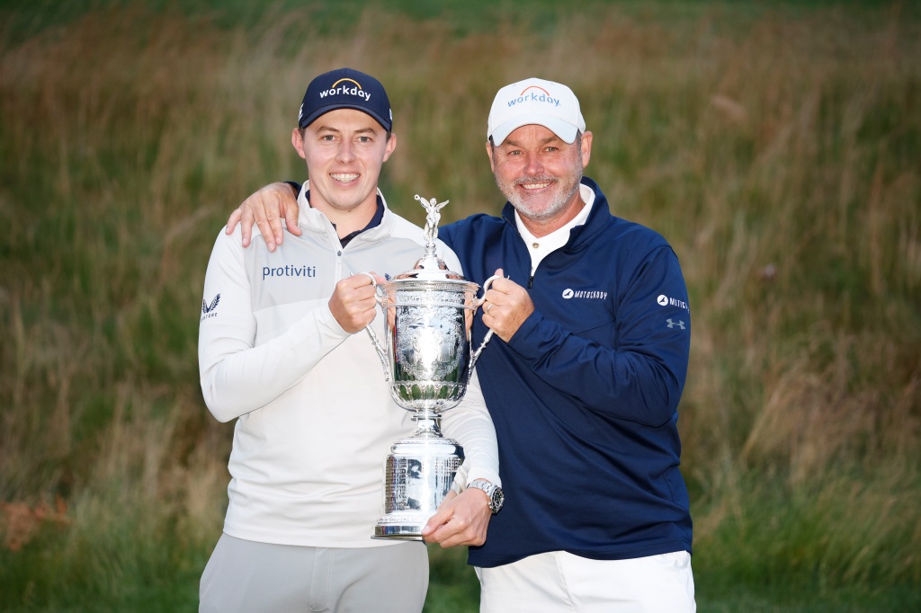 Billy Foster (right) and Matt Fitzpatrick hold up the US Open trophy.