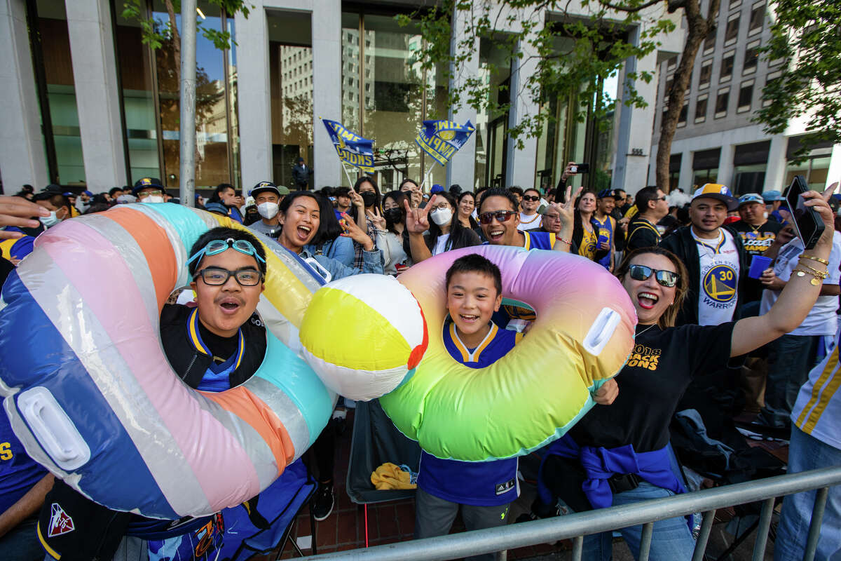 A few fans enjoy the "poole party" during the Golden State Warriors Championship parade down Market Street in San Francisco, California on June 20, 2022.