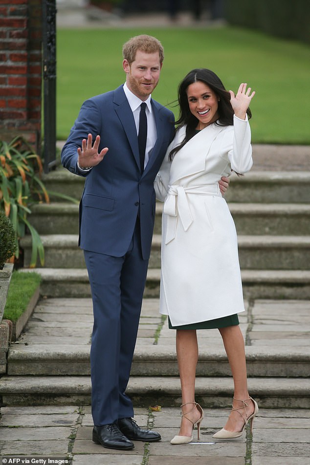 Buckingham Palace has effectively buried a report of bullying allegations by the Duchess of Sussex (seen with Harry at Kensington Palace)