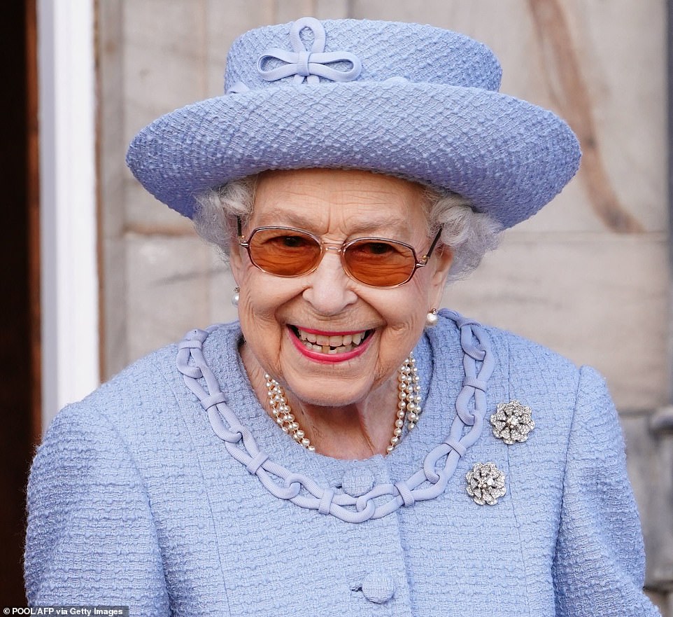 The Queen seemingly couldn't help but smile as she attended the unique military event alongside Prince Charles this afternoon