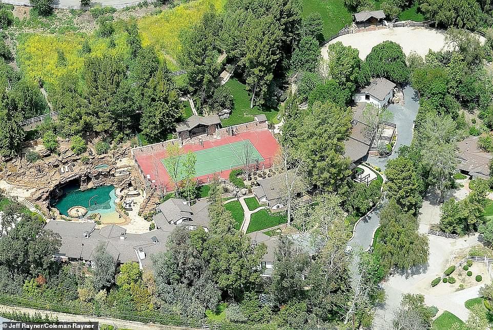 Moving on: Drake sold his 'YOLO' mansion in Hidden Hills, Calif., for $12 million, despite originally asking for $14.8 million in a deal closed Friday, according to TMZ