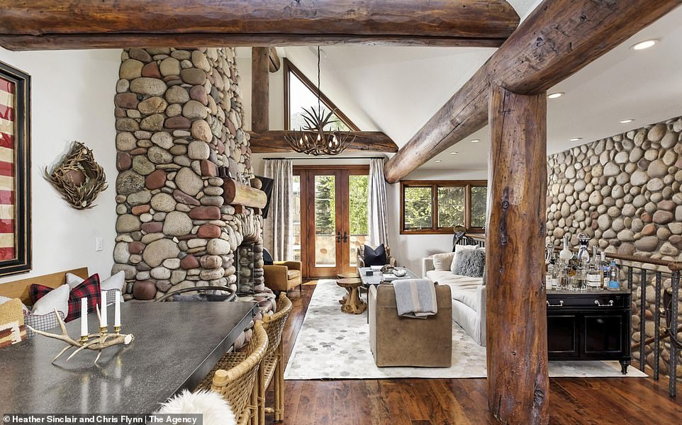 Living in the cabin!  Kyle Richards and her husband Mauricio Umansky have put their stunning retreat in Aspen on the market for $9.75 million