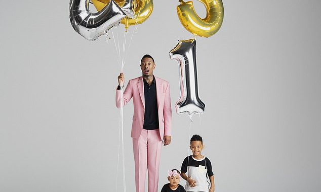 Big Daddy: Nick Cannon posed with two of his children for a new magazine photoshoot.  The 41-year-old actor was spotted with son Golden, 5, and daughter Powerful Queen, 1 for Men's Health