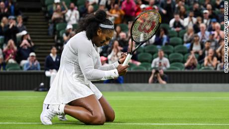 Williams fist pumps during her first round loss to Harmony Tan at Wimbledon. 