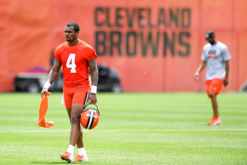 BEREA, OH - JUNE 01: Cleveland Browns Deshaun Watson #4 leaves the field as General Manager Andrew Berry follows after the Cleveland Browns offseason practice at the CrossCountry Mortgage Campus on June 1, 2022 in Berea, Ohio.  (Photo by Nick Cammett/Diamond Images via Getty Images)