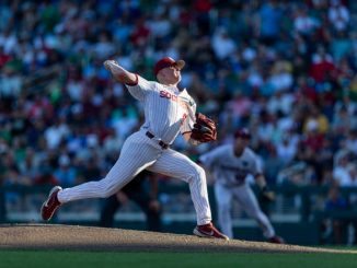 Oklahoma starting pitcher Cade Horton (9) throws in the second inning against Notre Dame during an NCAA College World Series baseball game Sunday, June 19, 2022 in Omaha, Neb. (AP Photo/John Peterson)