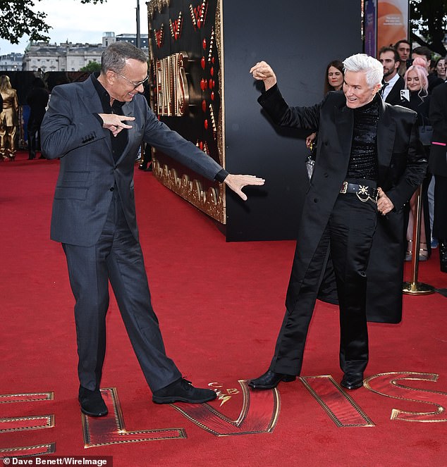Buddy: Tom Hanks put on an animated show on Tuesday as he fooled around with director Baz Luhrmann at a screening of Elvis at the BFI Southbank in London