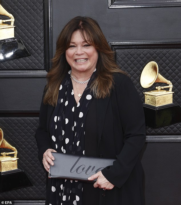The Latest: Valerie Bertinelli's estranged husband Tom Vitale has asked for spousal support a month after the actress filed for divorce after 11 years of marriage.  Bertinelli, 62, was pictured at the Grammy Awards in April