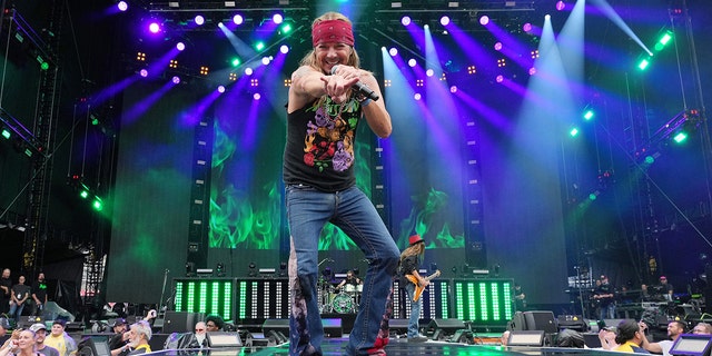 WASHINGTON, DC - JUNE 22: Bret Michaels of Poison performs onstage during Stadium Tour at Nationals Park on June 22, 2022 in Washington, DC.  (Photo by Kevin Mazur/Getty Images for Live Nation)