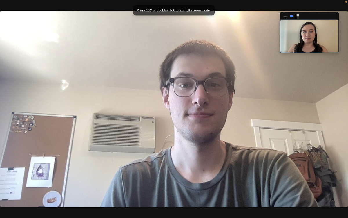 A screenshot of two users calling Zoom with MacBook cameras.