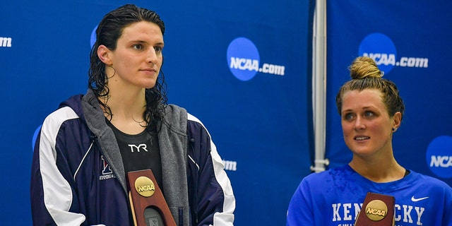 University of Pennsylvania swimmer Lia Thomas and Kentucky swimmer Riley Gaines react after placing 5th in the 200 freestyle final at the NCAA Swimming and Diving Championships March 18, 2022 at McAuley Aquatic Center in Atlanta to have.