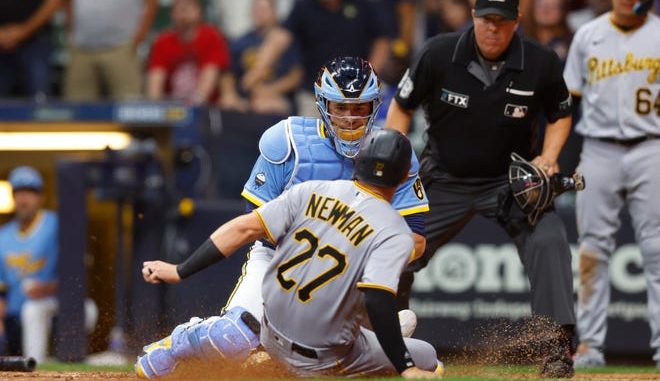 Brewers catcher Victor Caratini tagged Pirates second baseman Kevin Newman, who was the potential tie at the plate, to end Friday night's game at American Family Field.