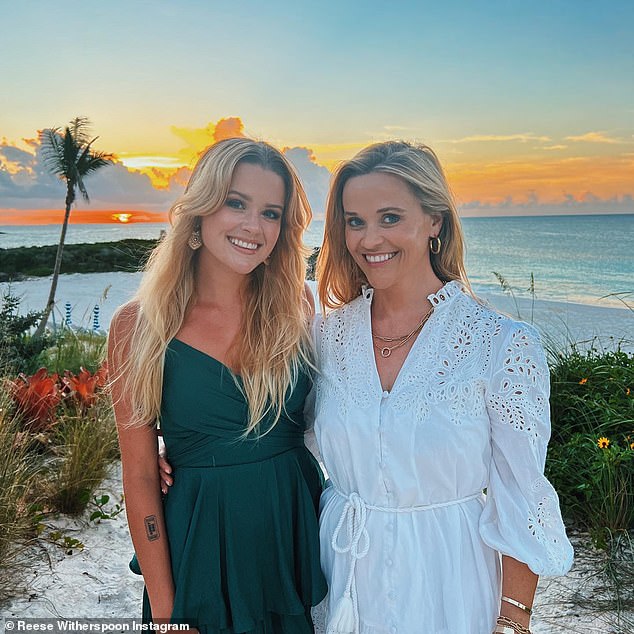 Virtually twins: Reese Witherspoon and her daughter Ava Phillippe looked almost identical in a series of new pictures of them posing against a dreamy sunset while on vacation