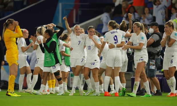 England's players celebrate their dramatic overtime win over Spain.