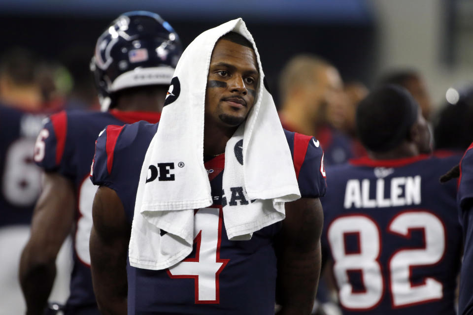 FILE - Houston Texans' Deshaun Watson (4) walks down the sidelines during the first half of a preseason NFL football game against the Dallas Cowboys in Arlington, Texas on August 24, 2019.  Thirty women who accused the Houston Texans of turning a blind eye to allegations that Watson sexually assaulted and harassed women during massage sessions have settled their legal claims against the team, their attorney said Friday, July 15, 2022 Watson, who has since been traded to the Cleveland Browns, has denied wrongdoing and vowed to clear his name.  (AP Photo/Michael Ainsworth, File)
