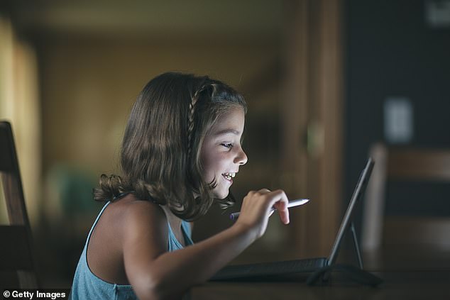 One study finds that exposure to blue light in early childhood can increase a child's risk of hitting early puberty and can also lead to long-term fertility problems.  Early puberty is associated with an increased risk of mental health problems and even certain cancers later in life (file photo)